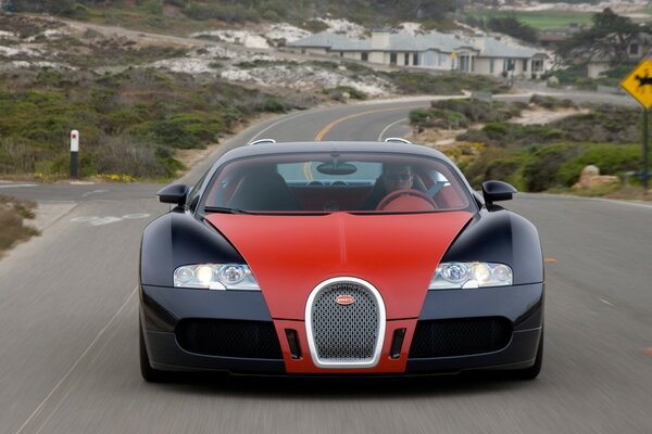Bugatti lascia la città la sera
