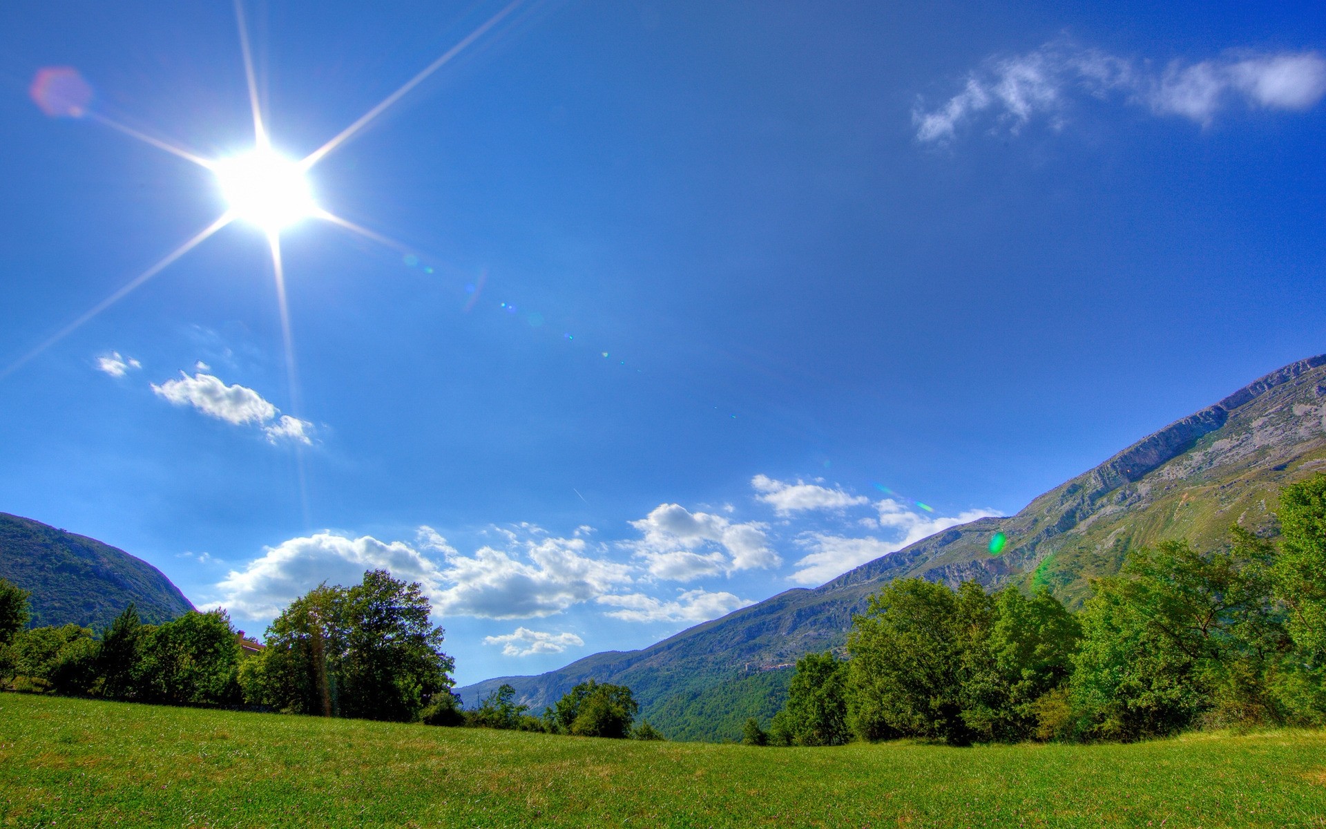 paesaggio natura paesaggio cielo erba montagna viaggi all aperto bel tempo sole legno estate legno rurale collina campagna