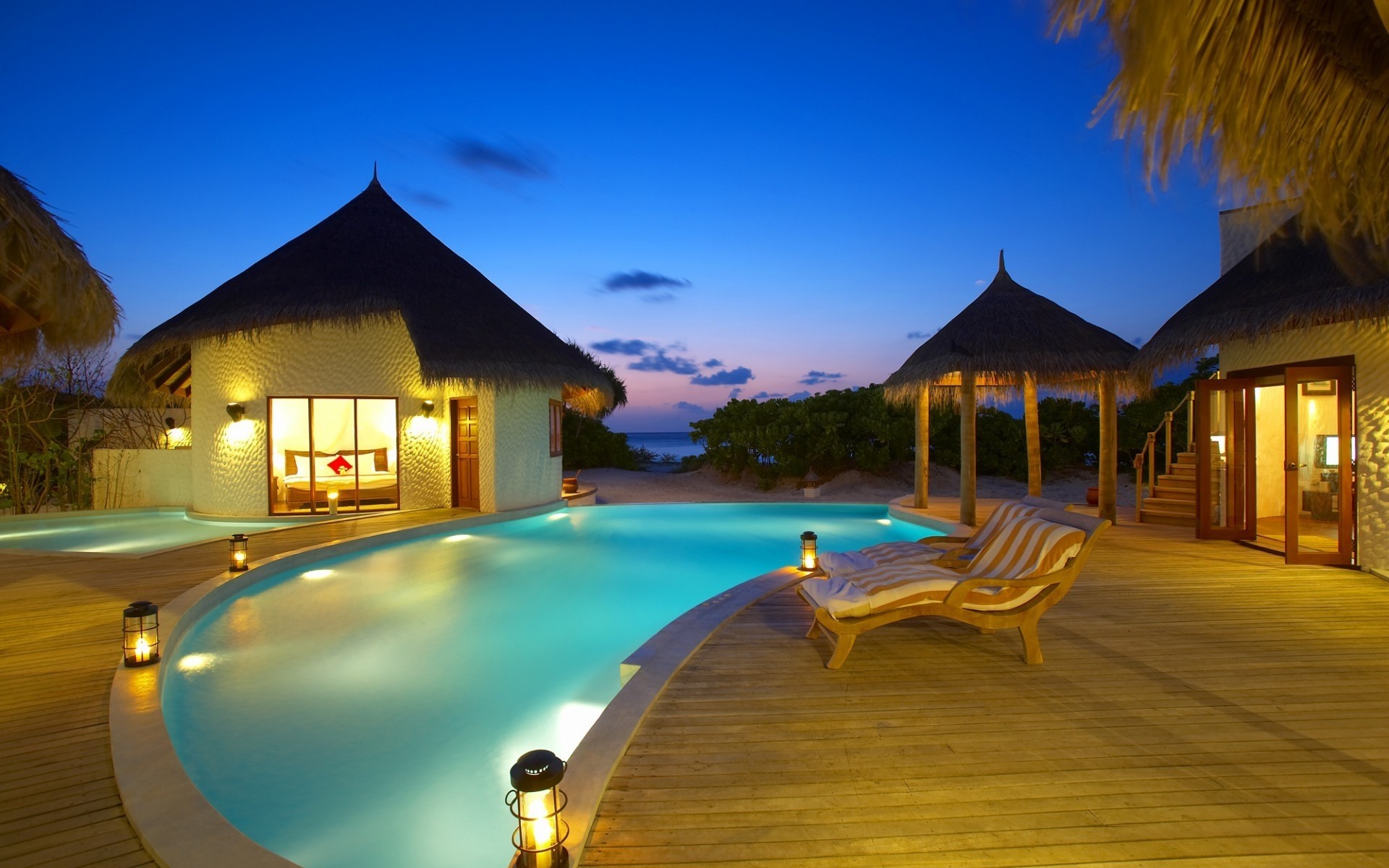 hotel spiaggia viaggi acqua resort piscina lusso oceano sole bungalow villa mare esotico tropicale nuoto piscina vacanza estate tramonto luce maldive