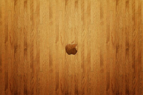 Logo Apple sul pavimento in legno