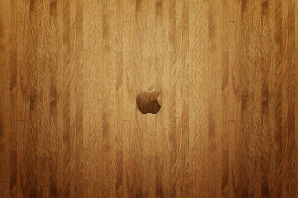 Logo Apple sulla superficie di legno