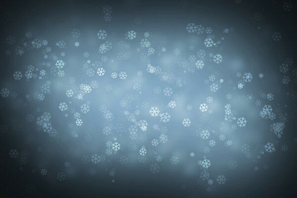 Fiocchi di neve che cadono nel cielo scuro